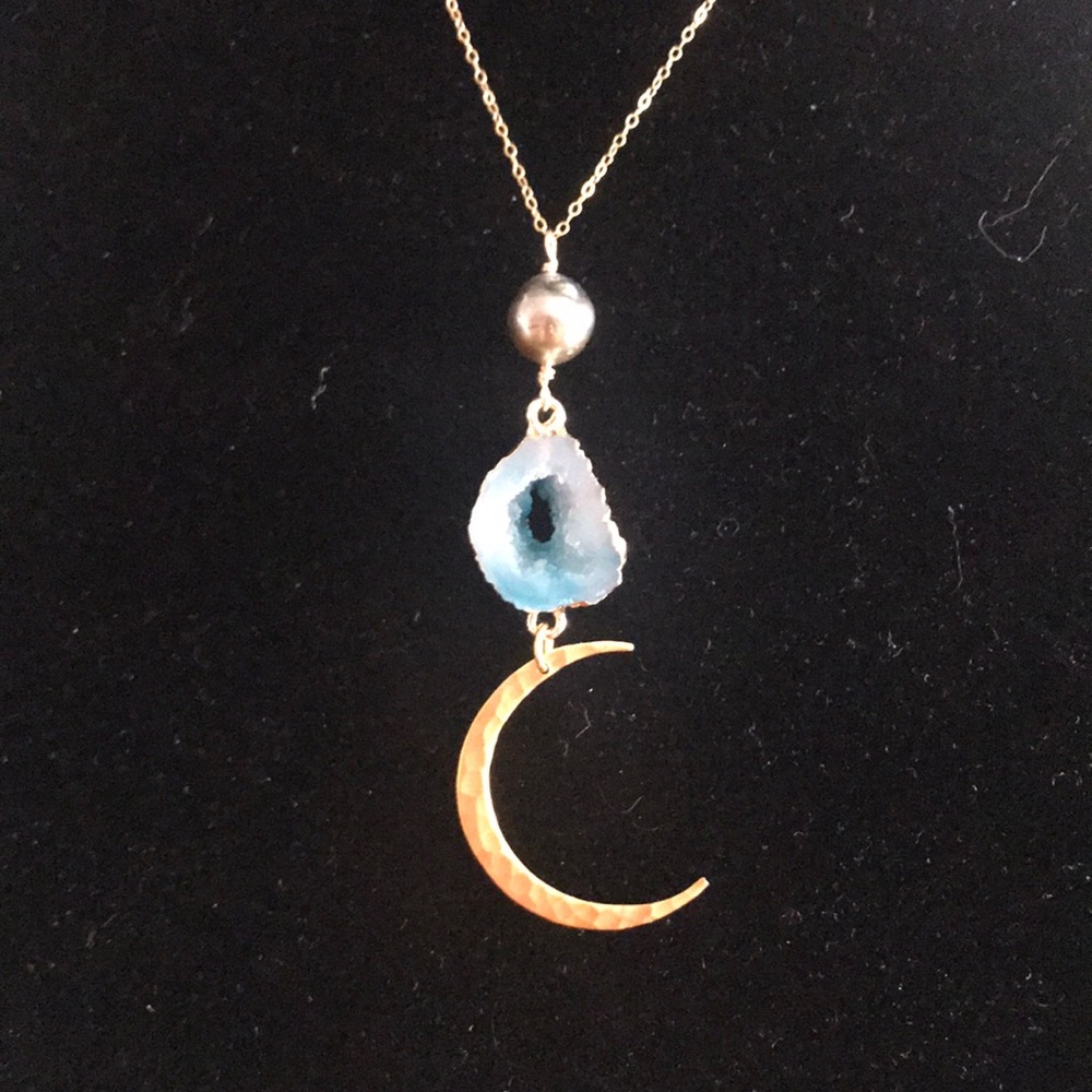 Tahitian pearl necklace with a moon pendant